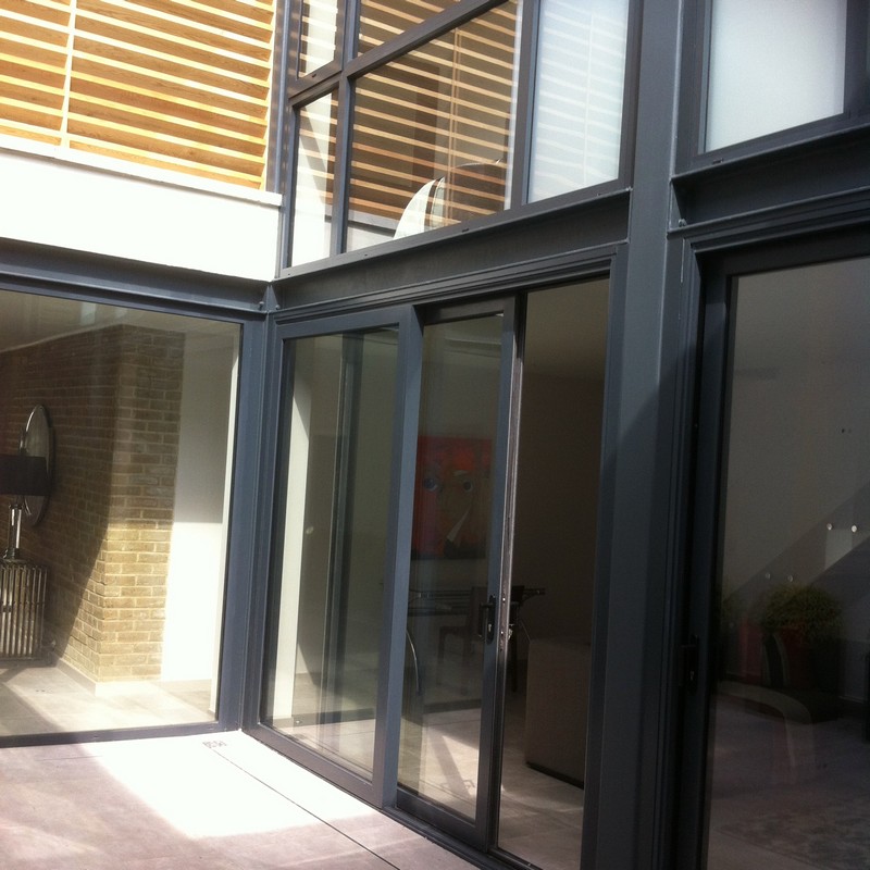 Anthracite aluminium sliding patio doors fitted in Abbey Wood
