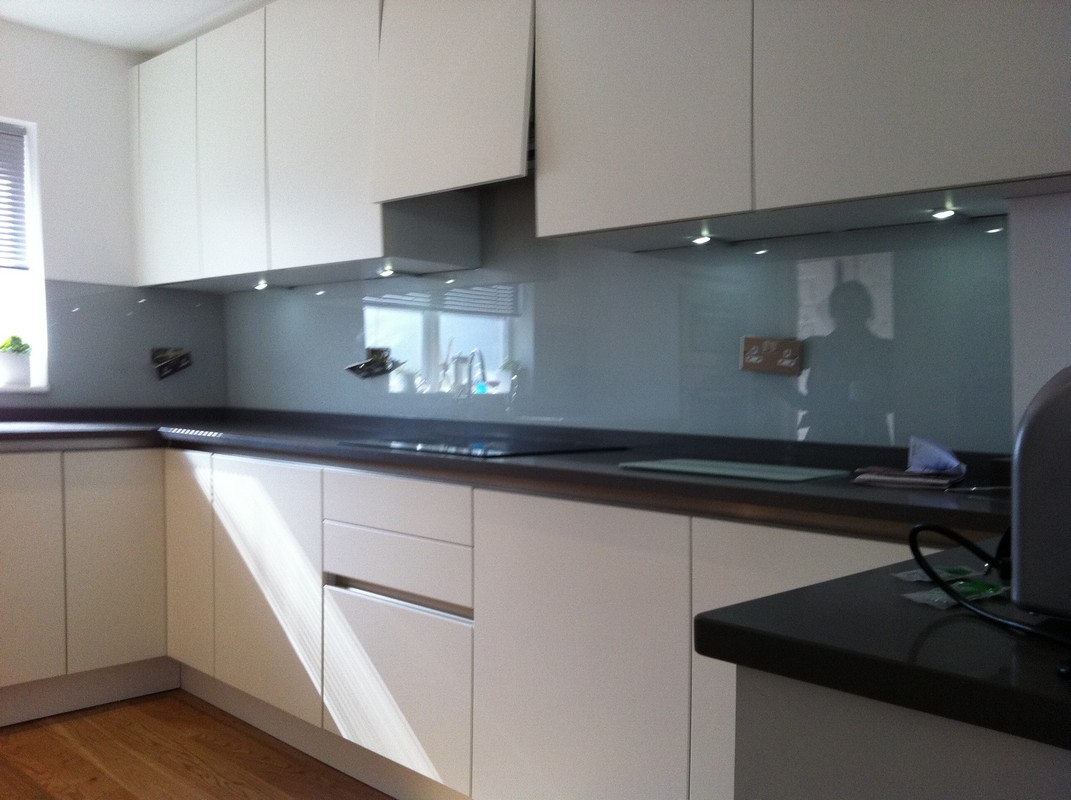 Grey glass kitchen splashback with LED lighting in Abbey Wood
