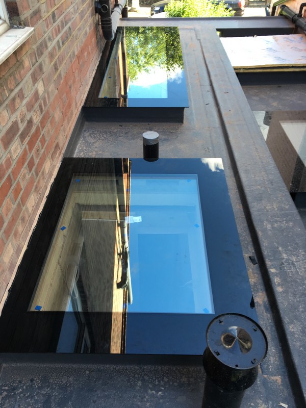Multiple flat roof skylights on extension in Abbey Wood